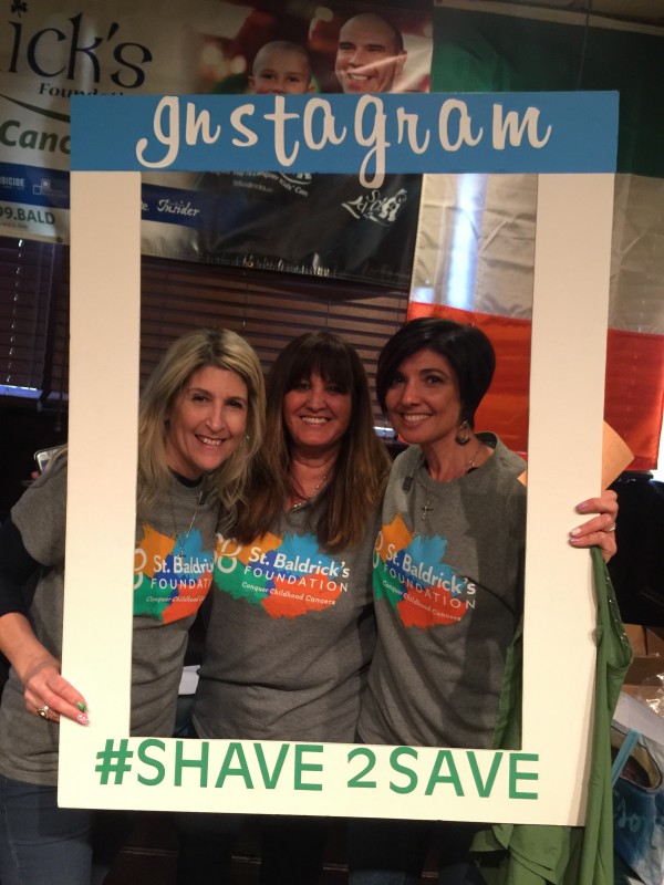 Our volunteer shavers snapping a pic!