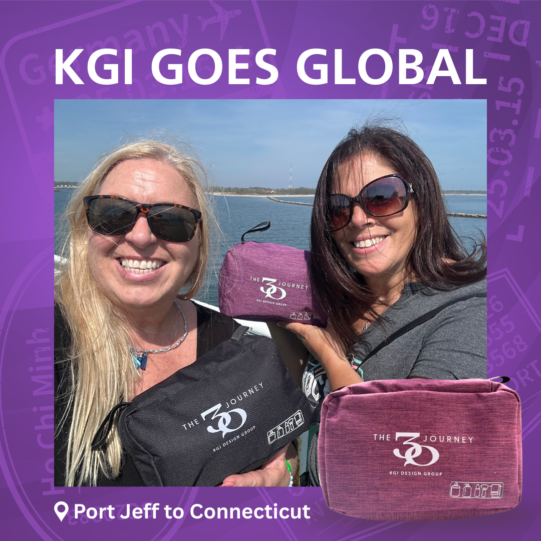 two people posing with branded travel bag design