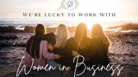 Women sitting together on the beach