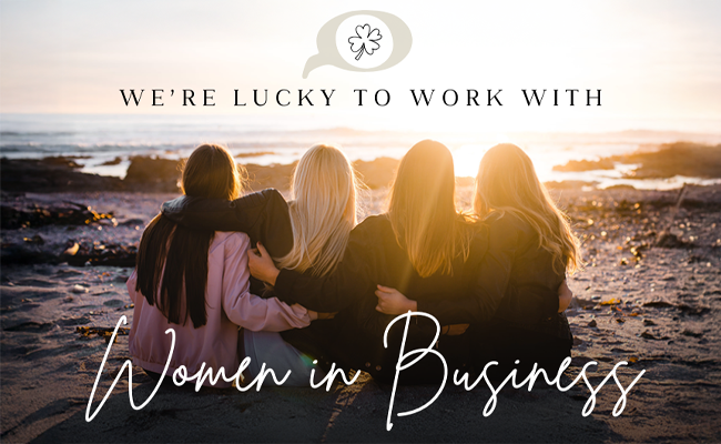 Women sitting together on the beach